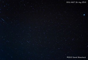 Two Perseid meteors streak across the early morning sky a few days before the peak.