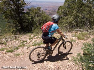 Riding along the edge of the Grand Canyon on the Rainbow Rim Trail.