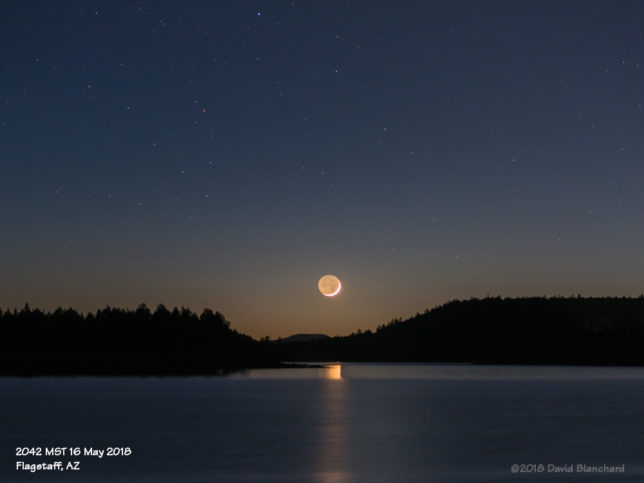 Crescent Moon with reflections on Lake Mary.