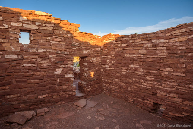 Moon rise over the interior of Lomaki Pueblo.