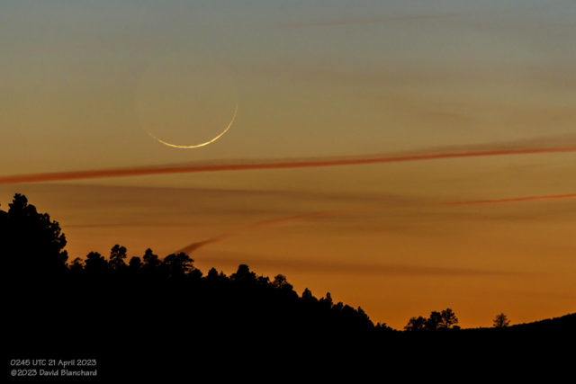 The crescent Moon sinks lower in the sky.