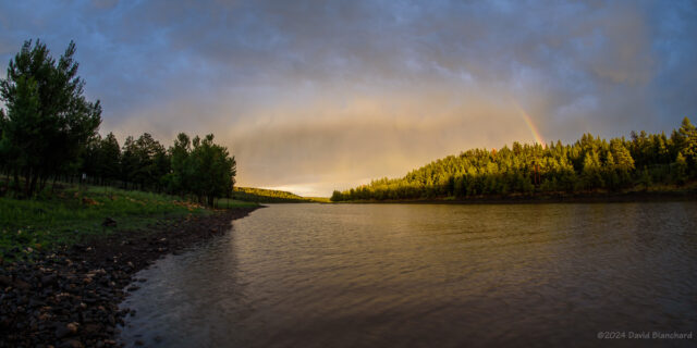 A partial rainbow over Upper Lake Mary near Flagstaff, Arizona.