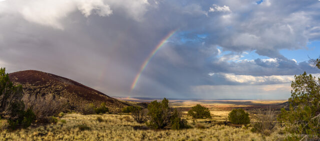 A partial rainbow over the grasslands of Wupatki National Monument.