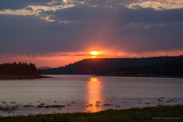 Sunset and reflected sunlight on Lake Mary.