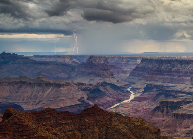 Mid-afternoon thunderstorms produce lightning over Grand Canyon.