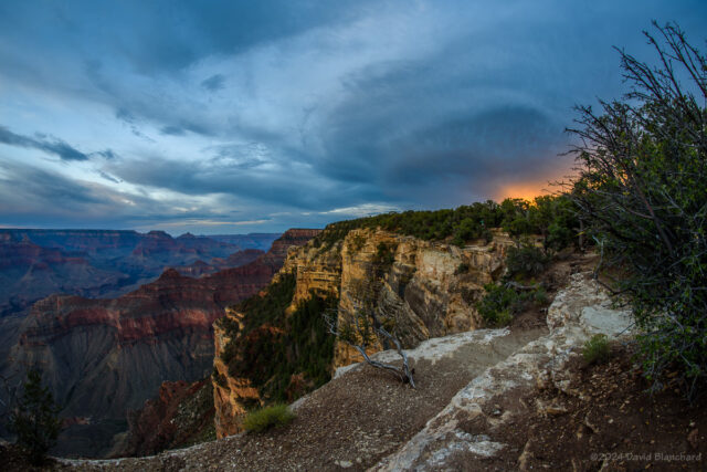 Sunset brings some muted colors to convection over Grand Canyon.