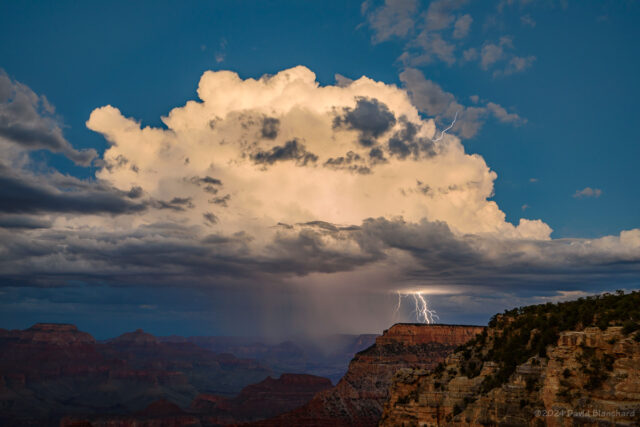 Cloud-to-ground and cloud-to-air lightning emanate from this storm over Grand Canyon.