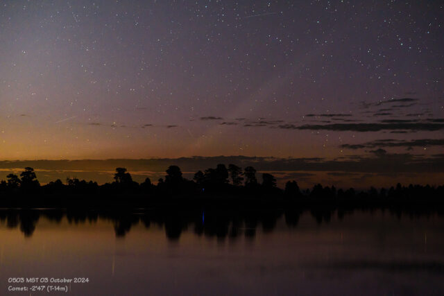 The comet is below the horizon but the tail extends well up into the twilight sky. (03 October 2024)