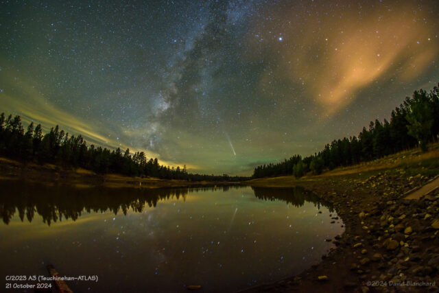 Comet and Milky Way reflected in the still waters of Lake Mary.