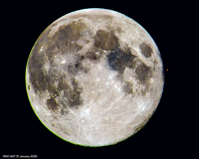 The Moon and Mars. Mars has just reappeard from behind the lunar disk.